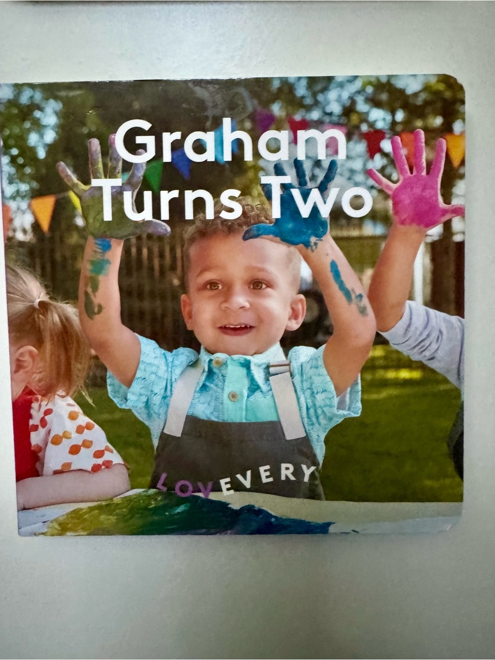 Lovevery Kids Apron in Teal - Graham Turns Two